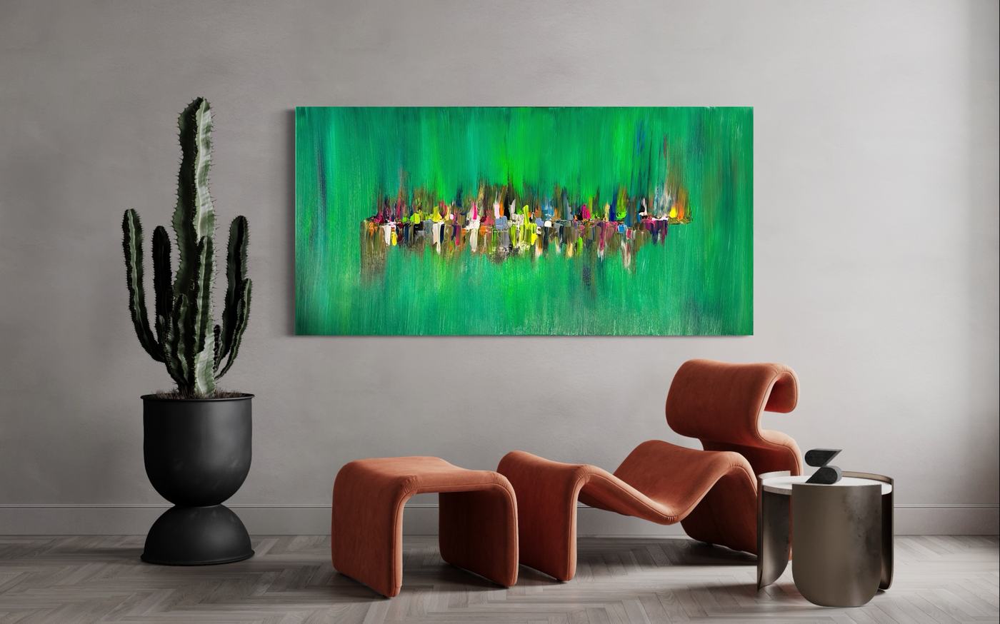 Quadro verde con una fascia di colori al centro, appeso in un soggiorno